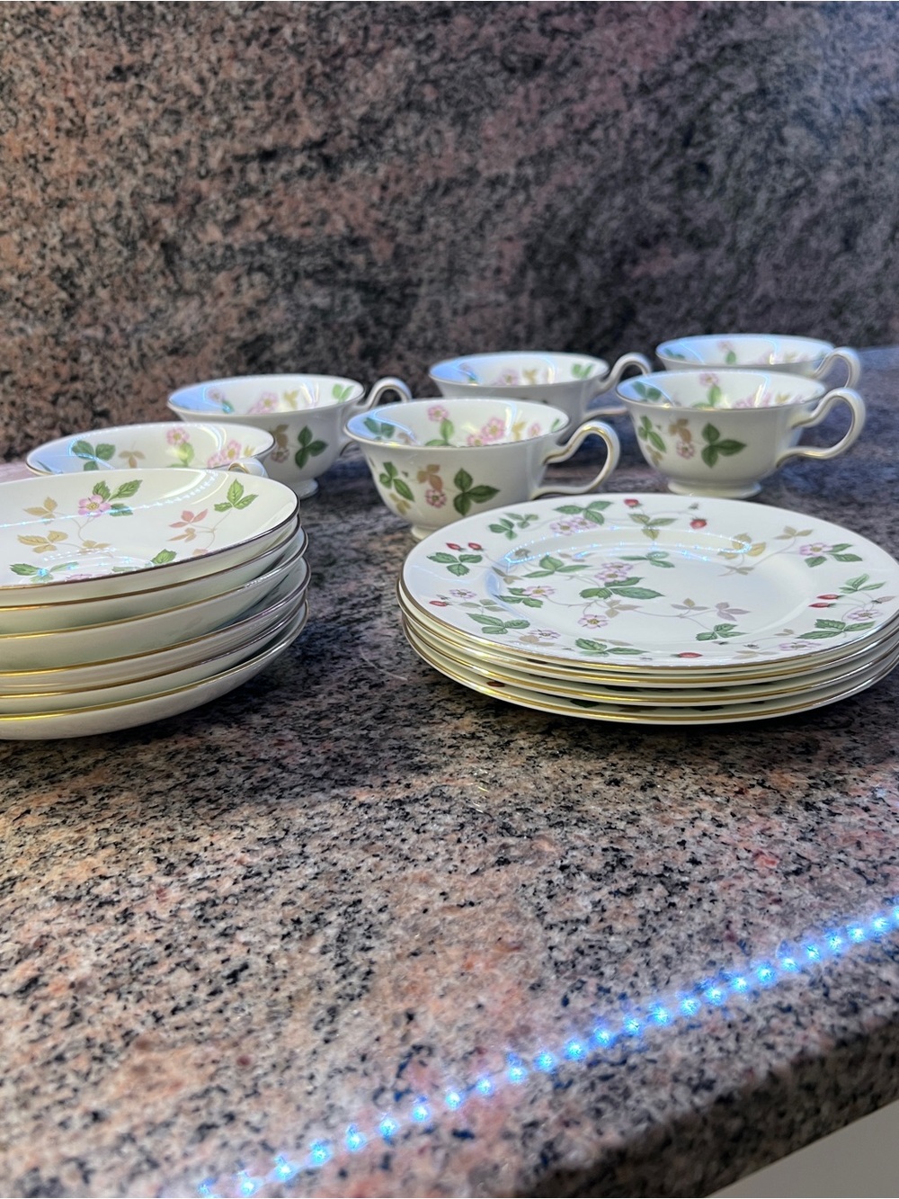Wedgwood White Porcelain Teacup and Saucer with Pink Floral and Green Leaf Motif